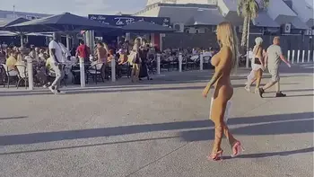Monika Fox Walks The Streets Of Cap d'Agde Naked