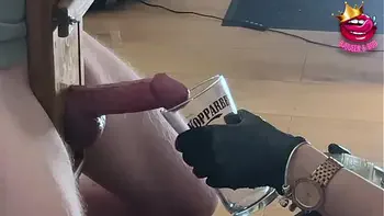 Close up femdom edges cock to ruined orgasm in a glass