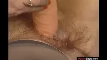 Old lady deals dildo up her bush during home casting