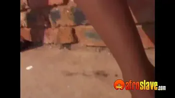 African sub slave t. outdoors