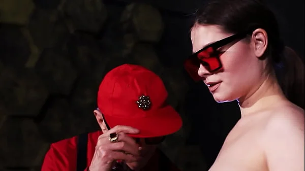 Clothed man and naked women