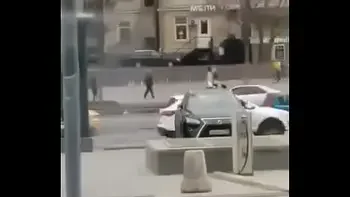 Stupid blonde gives blowjob in public