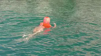 Blue water and a naked girl!