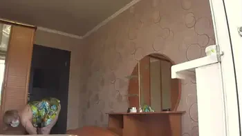 Neighbor watches chubby milf through open window. PAWG.