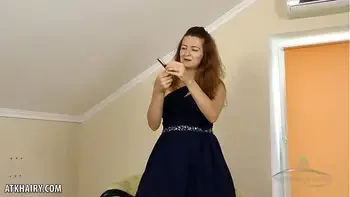 Fiery Helen Volga rubs her hairy pussy