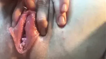 Close up- MILF Stella watches porn and plays with her clit head until she cums