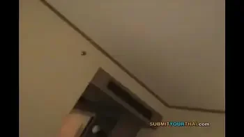 Two Oriental skanks jerk off a big cock