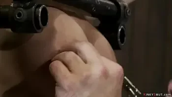 Shackled busty slave squirts on Sybian