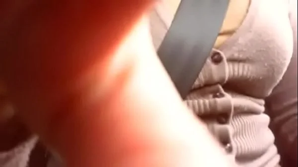 Nicoletta takes a ride in the car masturbates and fills her hands with squirting as she comes