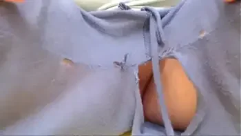 Nicoletta completely destroys her pants in a public garden and pisses on herself