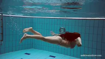 Hot naked girls underwater in the pool