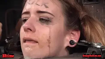 Bdsm babe trapped in a barrel and electrified