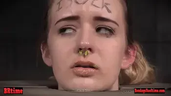 Gagged drooling brunette is dominated