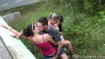 A girl with huge natural tits and a y. chick fucked in a public street foursome by 2 hung guys with big dicks doing oral deep throat oral blowjob and sexual intercourse in the doggy style position and cum on her gorgeous big natural boobs