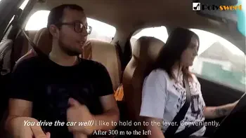 Girl jerks off a guy and masturbates herself while driving in public (talk)