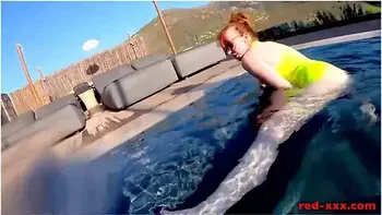 Red Xxx - Fucks Her Pussy With A Toy In The Pool