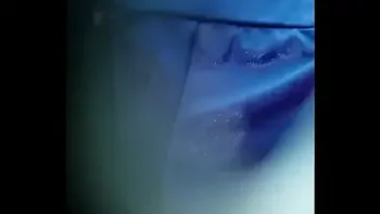 Peeping through the hole in the wall in the beach cabin.