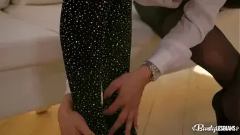 Busty lesbians Florane Russell and Barbara Bieber foot play in pantyhose