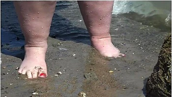 Fat Bare Legs With Red Pedicure Walk Along The Bank Of The River, Fetish