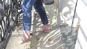 Wetting Jeans And Smoking On Balcony