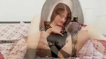 July lays in bed masturbating with fingers and toy - WeAreHairy