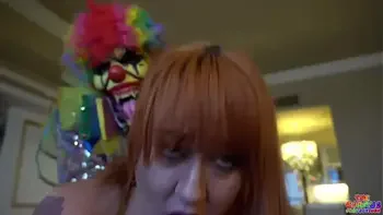 Busty Redhead Milf gets her pussy destroyed by clown