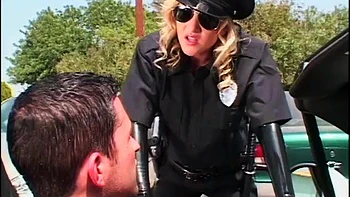 Slutty police officer in latex uniform getting fucked