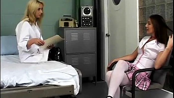 Dominant nurse whipping brunette bitch and covering her with wax