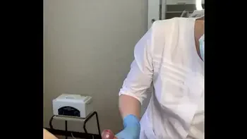 The patient CUM powerfully during the examination procedure in the doctor's hands