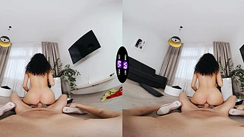 A sexy walk of a brunette teen with long hair in a mini dress