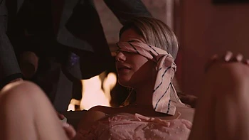 Nella Jones rides a big cock with intense pleasure in a steamy scene.