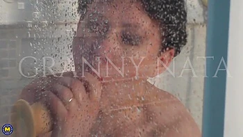 Modern Grandma Nata Loves To Play With Her Dildo And Her Pussy In The Bathroom