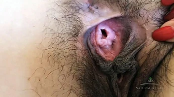 Nari Park shows off her thick pubic hair and dark, meaty pussy lips while she fingers: Porn