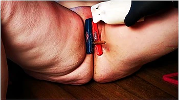 Labia And Clit With Candle, Clips And Brush