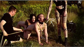 Charlotte Sartre And Lydia Black In Human Centipede Gets Anal Training With Corn On The Cob Strapon