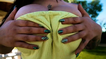 Tattooed Babe Avalon Mira Flaunts Her Big Tits Outdoors