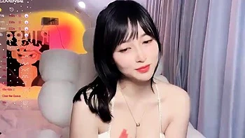 Naughty Asian milf Julia solo masturbation close up