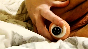 Suzy demonstrates how rubber cock enters her pussy close up