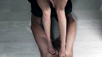 Light femdom and foot fetish play with brunette