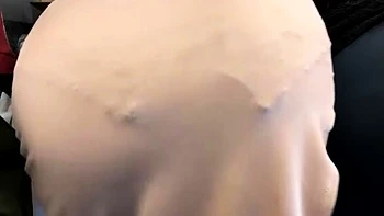 Brunette seductress working her big boobs and hot ass