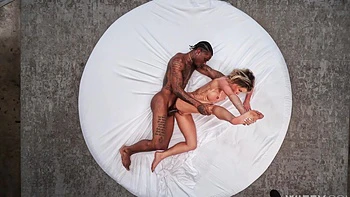 Cassie Bender gets her shaved pussy smashed by bbc in a hot interracial scene.