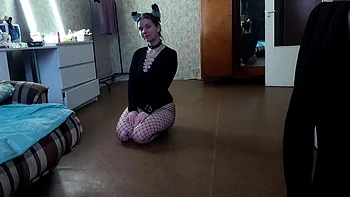 Sexy kitty eats from a bowl and licks her master's feet -