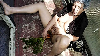 Chubby lady with natural tits Rosa fucks with vegetables on the balcony