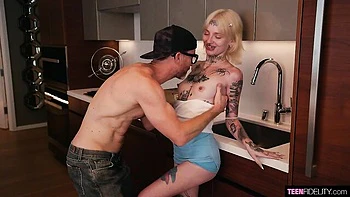 Tattooed young blonde Riley Moon impaled in her lovely poses