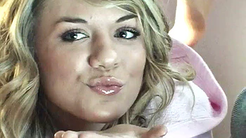 Sexy petite lesbians teasing the camera in close up