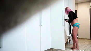 Spy cam sees hot blonde stripping