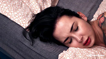 Naughty brunette plays with huge cock