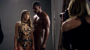 Two cute girls, Ashley Lane and Naomi Swann, share a big black cock in an intense threesome.