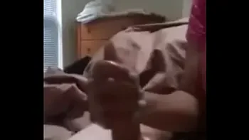 step mother makes a handjob to her before going to s.