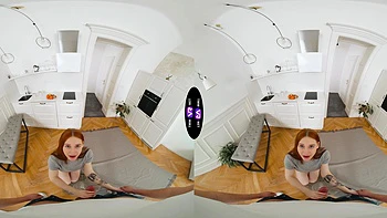 A beautiful freckled redhead girl in reverse cowgirl position